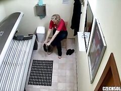 Older MILF Tanning her Shaved Tight Pussy