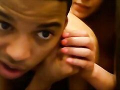 Mature Mizoram aunty lying in bed wearing only bra